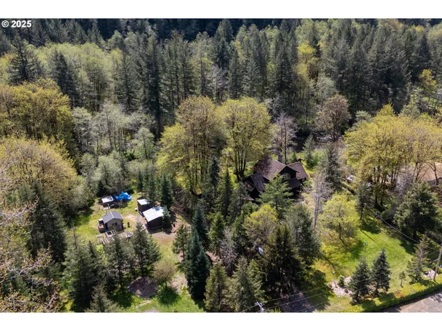 a terrace of a house with wooden floor and outdoor seating