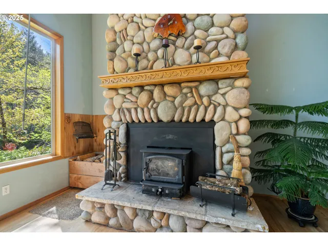 a living room with furniture and large windows