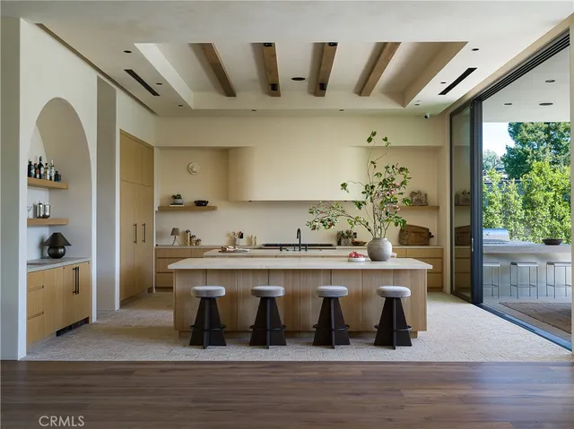 a kitchen with a stove and a sink