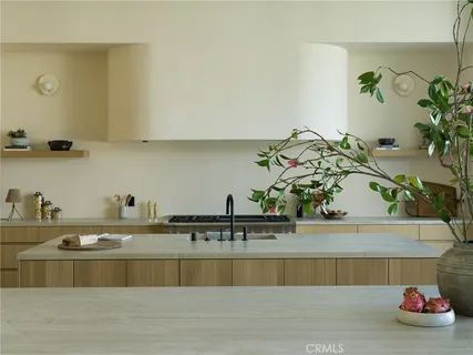 a view of kitchen with cabinets and wooden floor