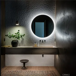 a bathroom with a toilet and a sink