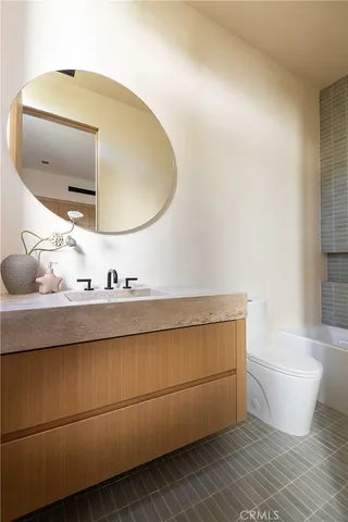 a living room with a couch and a flat screen tv