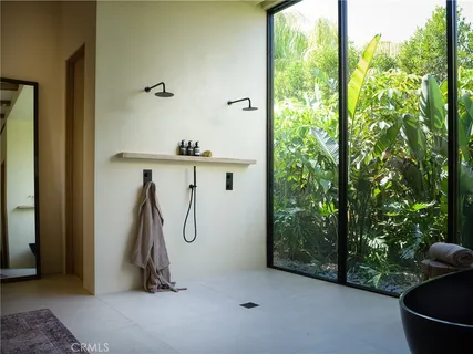 a view of a patio with swimming pool table and chairs
