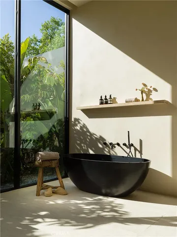 a view of a house with swimming pool and porch