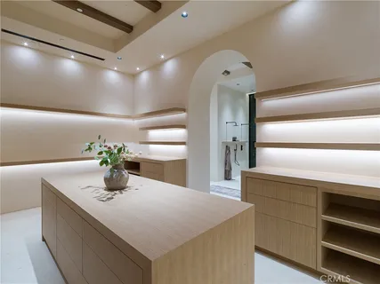 a view of a pool table and chairs in the patio