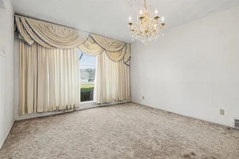 a view of a chandelier in a room