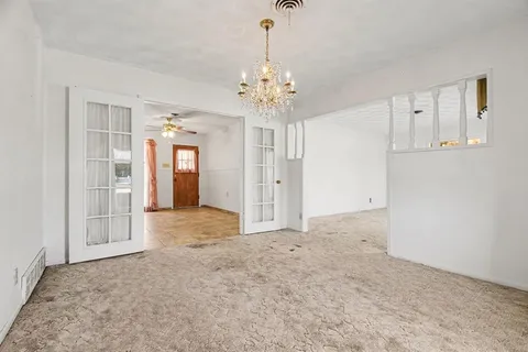 a view of an empty room with window