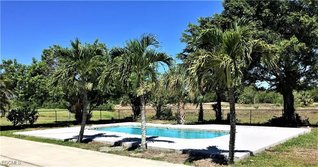 a sign board with yard