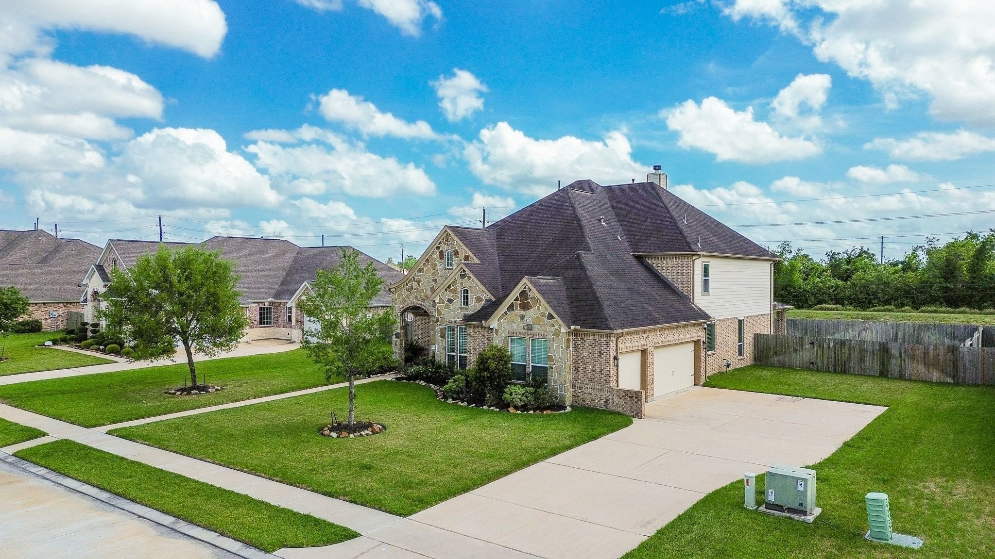 2714 Topaz Cove Lane Rosharon, TX 77583 - Photo 4 of 50 a view of a house with a big yard