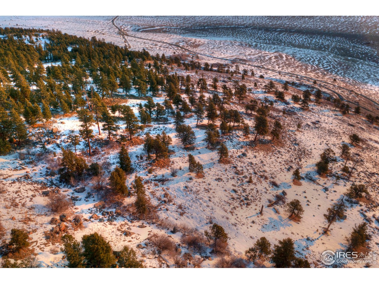 9352 Eastridge Road Golden, CO 80403 - Photo 18 of 23 a view of city and mountain