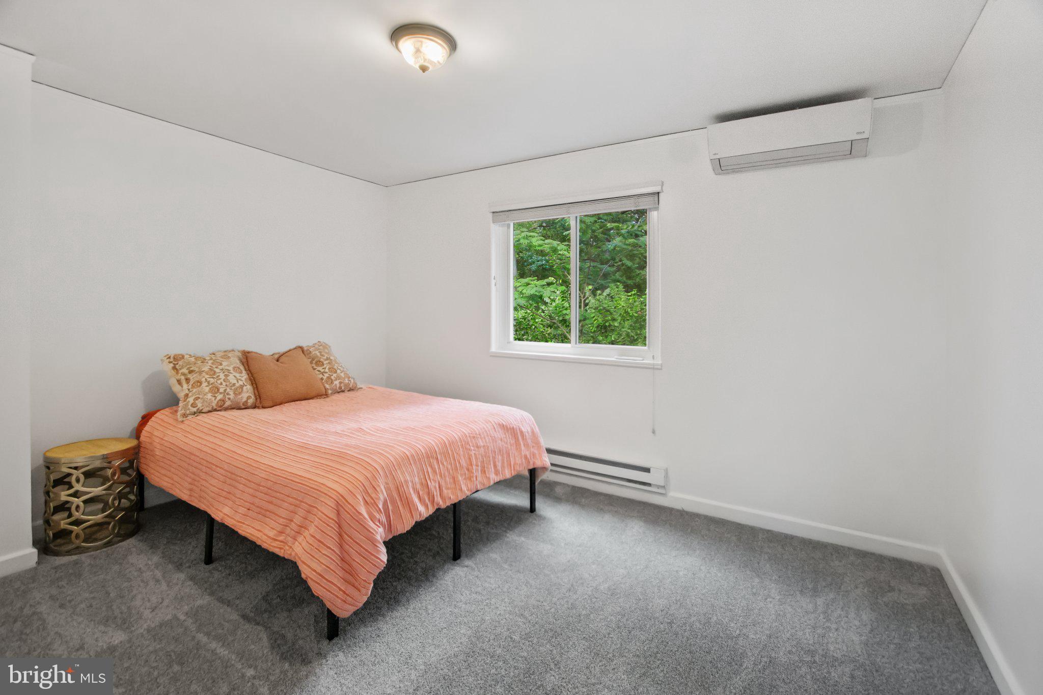 30 Ridge Road, Unit B Greenbelt, MD 20770 - Photo 23 of 30 Serene bedroom with nature views.