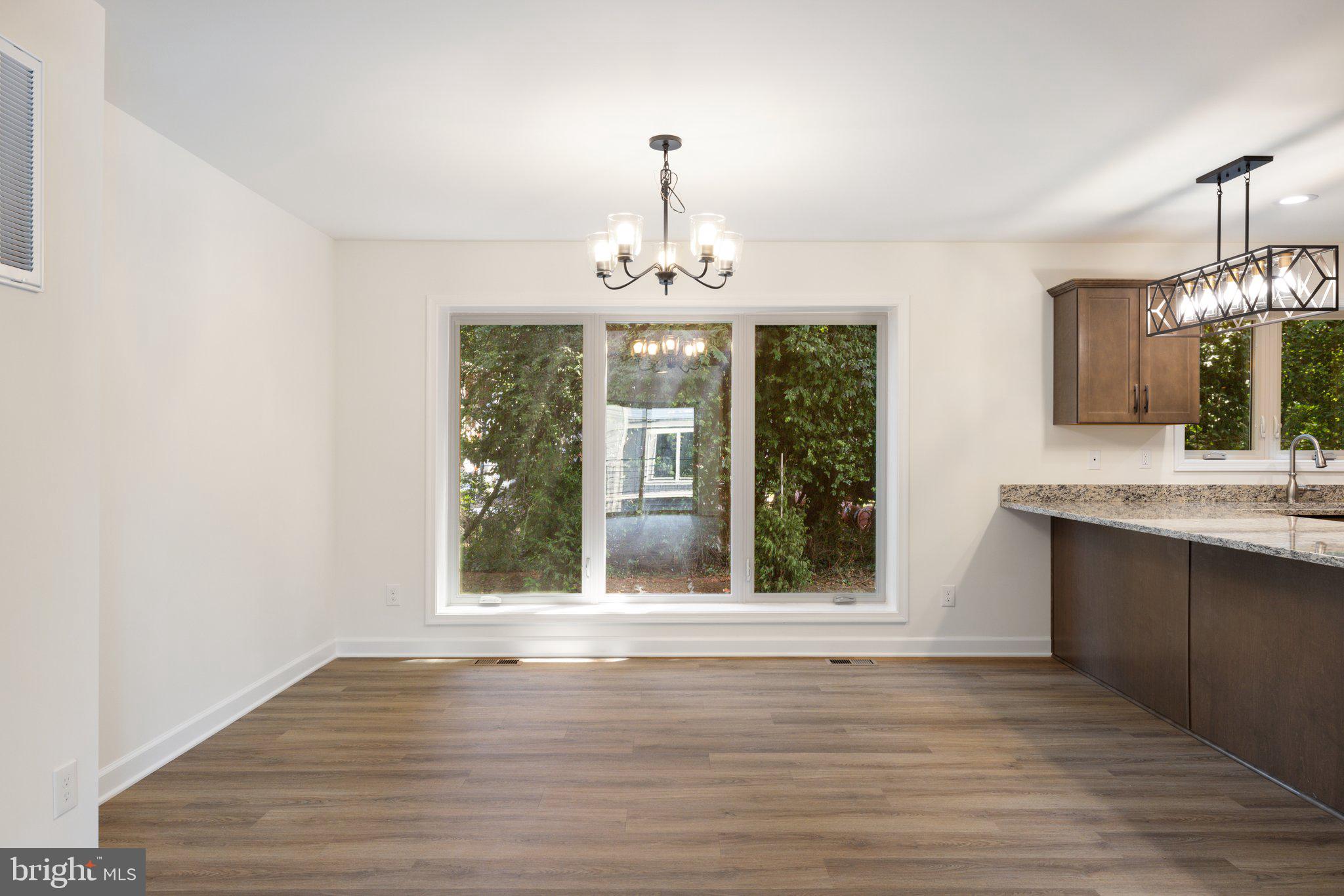 141 Oak View Street Culpeper, VA 22701 - Photo 15 of 46 a view of an entryway with wooden floor and a front door