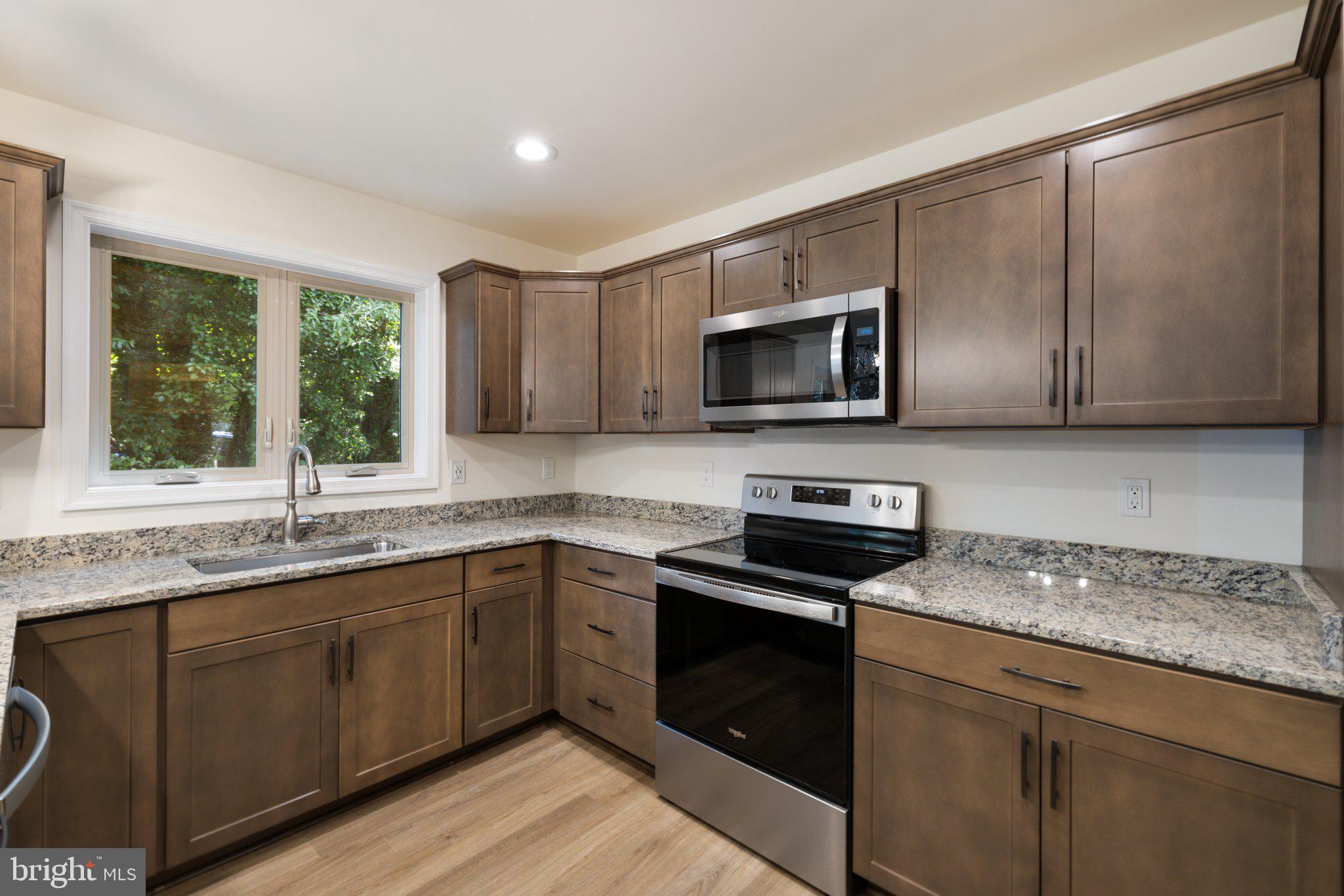 141 Oak View Street Culpeper, VA 22701 - Photo 20 of 46 a kitchen with a sink stove and microwave