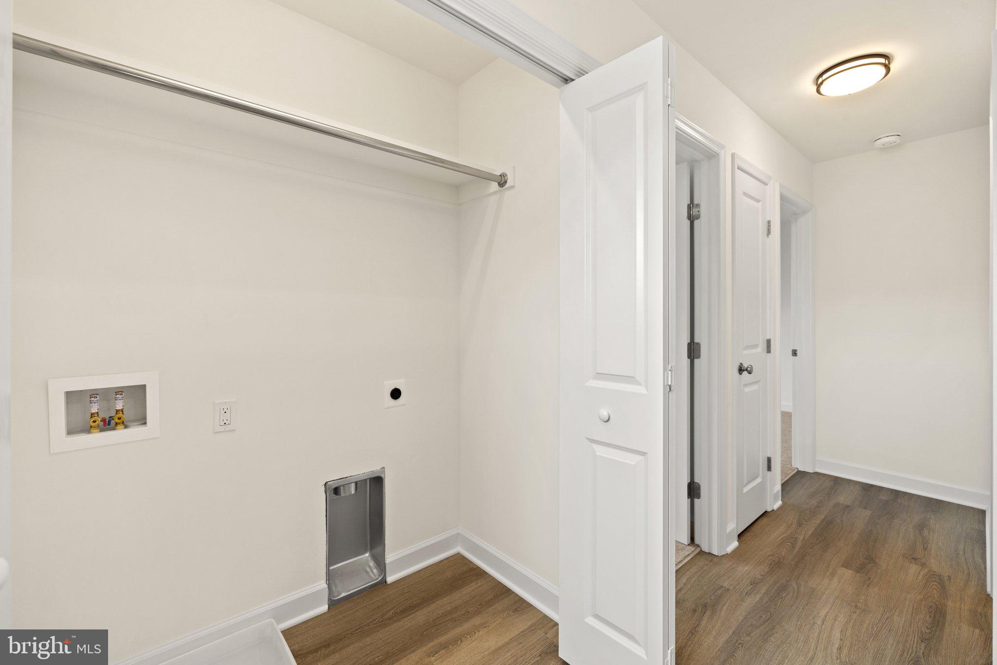 141 Oak View Street Culpeper, VA 22701 - Photo 31 of 46 a view of a hallway with wooden floor
