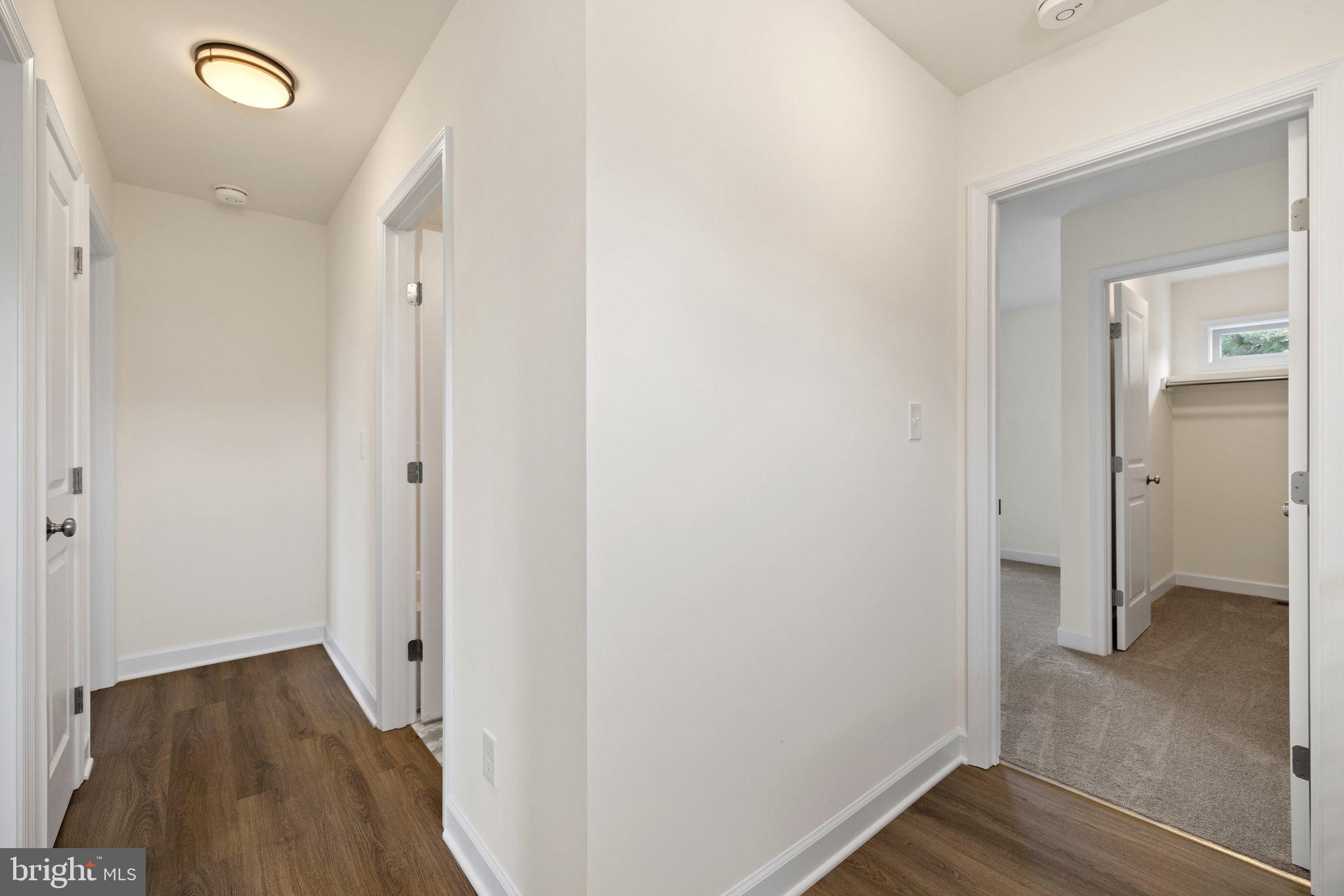 141 Oak View Street Culpeper, VA 22701 - Photo 32 of 46 a view of hallway with wooden floor