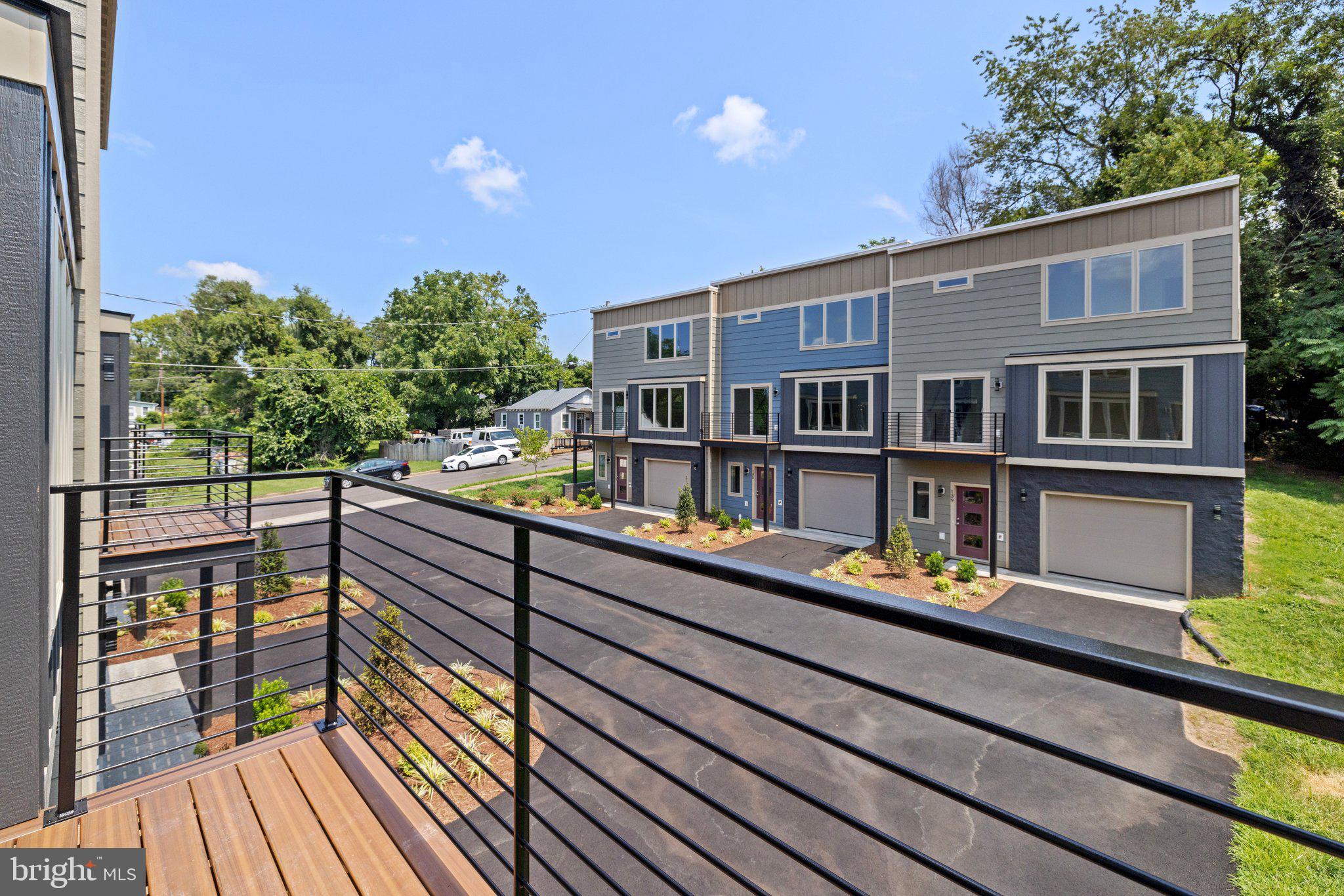 141 Oak View Street Culpeper, VA 22701 - Photo 44 of 46 a balcony with wooden floor and outdoor seating