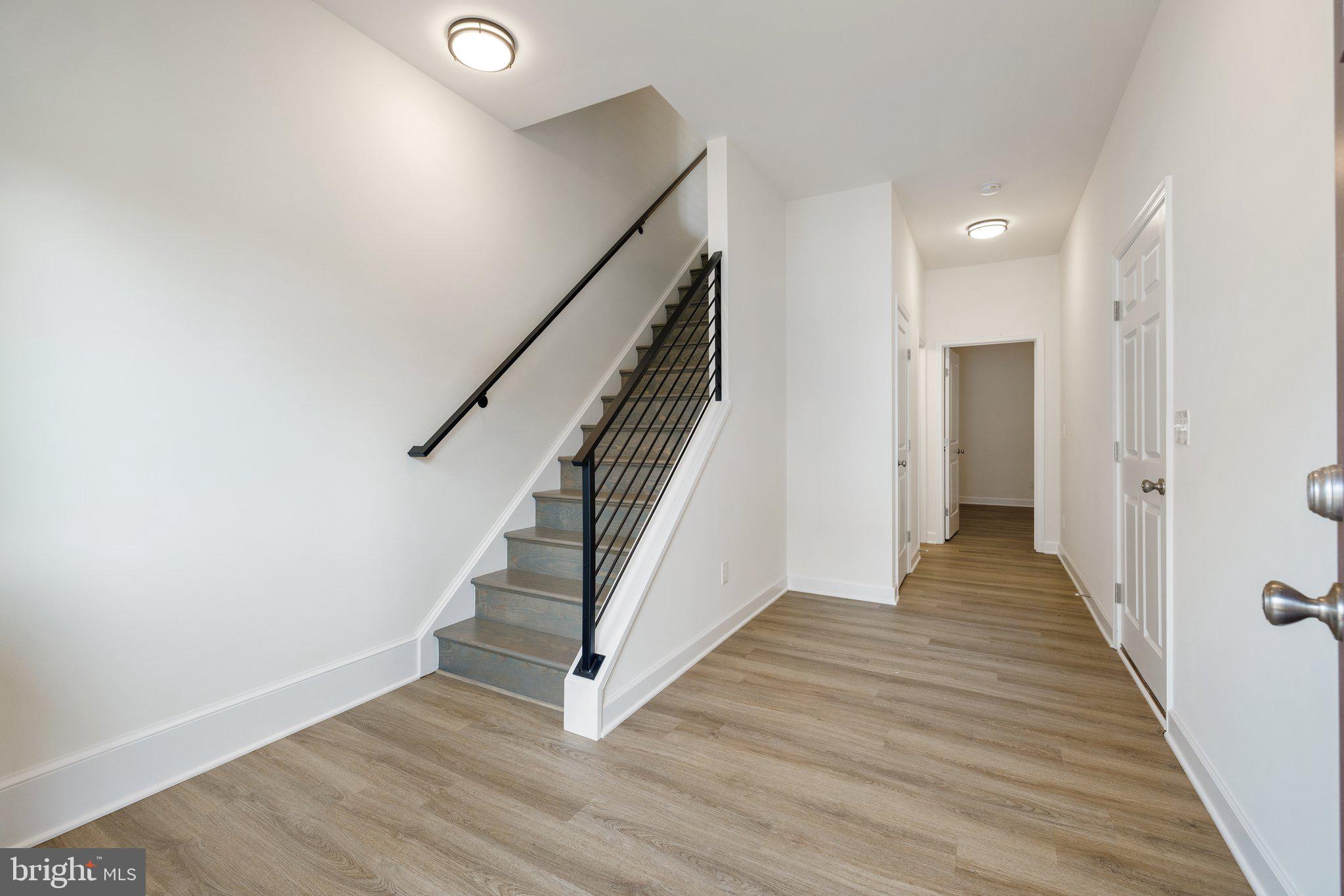 141 Oak View Street Culpeper, VA 22701 - Photo 5 of 46 a view of a hallway with wooden floor and entryway