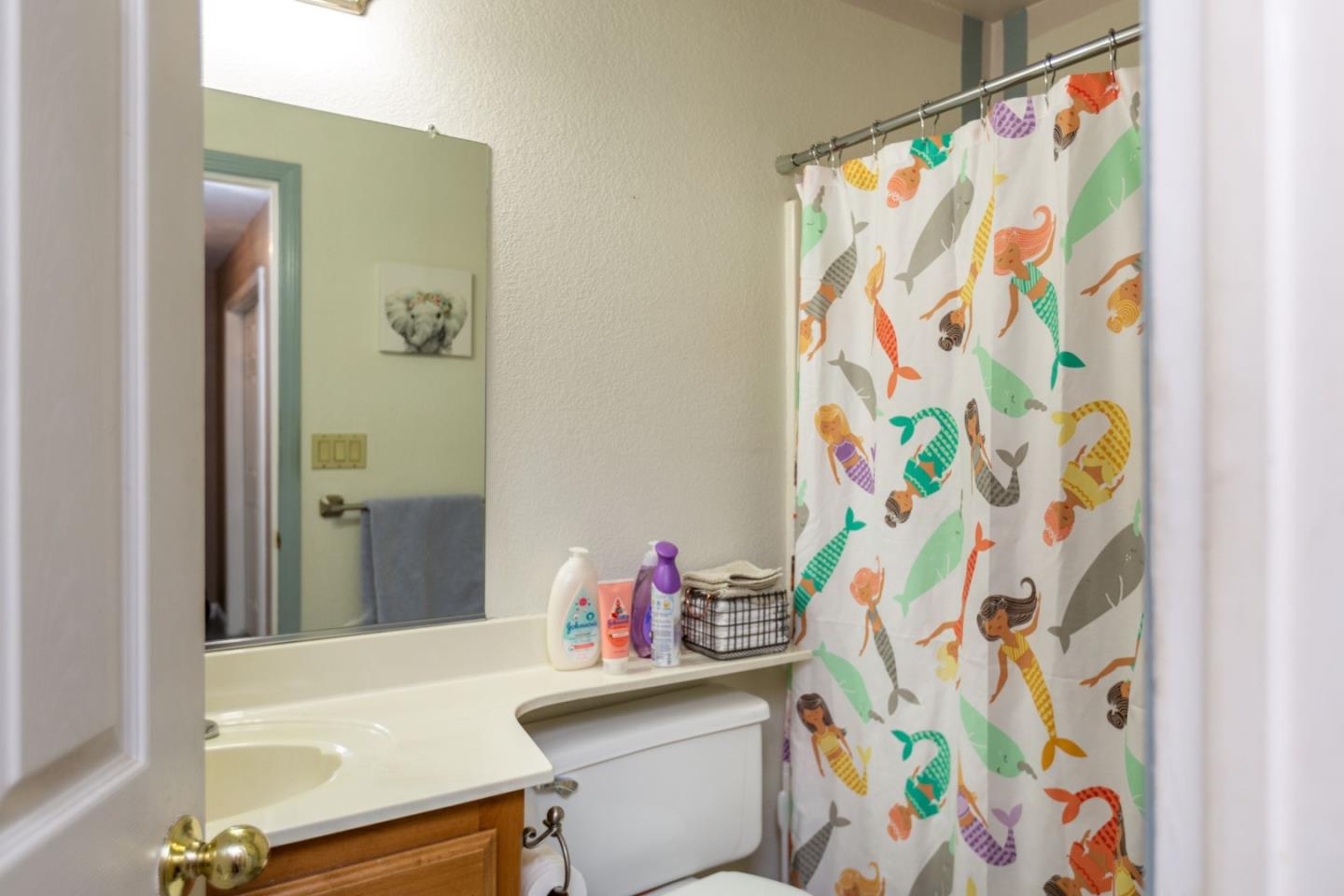 2085 Roth Court Turlock, CA 95380 - Photo 22 of 26 a bathroom with a sink and a mirror