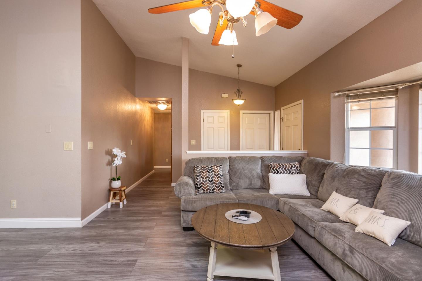 2085 Roth Court Turlock, CA 95380 - Photo 7 of 26 a living room with furniture and a large window
