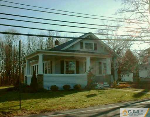 631 Ridge Road Monmouth Junction, NJ 08852 - Photo 1 of 8 a front view of a house with garden