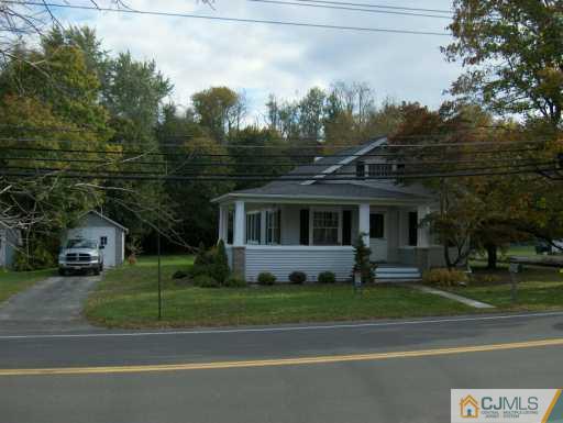 631 Ridge Road Monmouth Junction, NJ 08852 - Photo 6 of 8 a view of a yard in front of house
