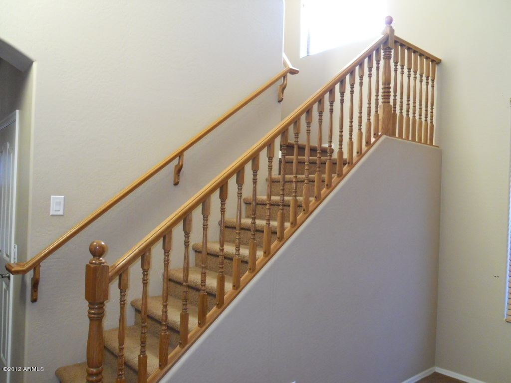 8835 West Payson Road Tolleson, AZ 85353 - Photo 15 of 19 Upgraded Stair Railing