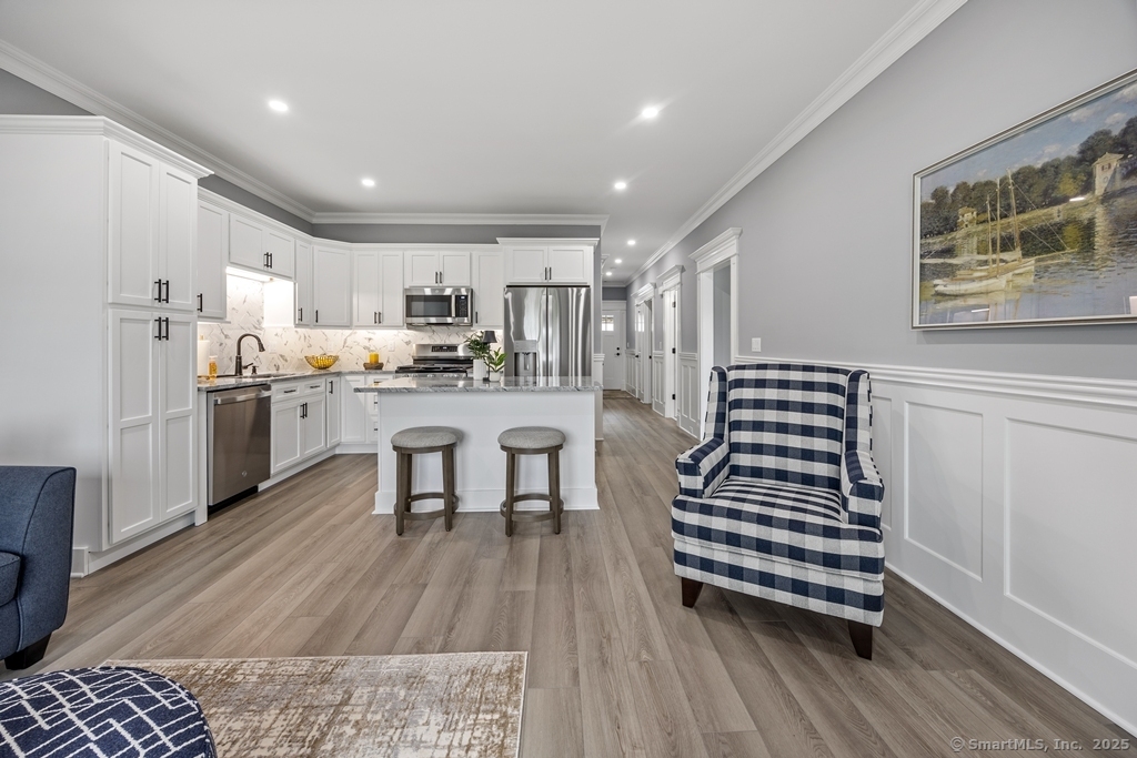 210 Munson Road, Unit 3C Wolcott, CT 06716 - Photo 5 of 23 Living room view of kitchen
