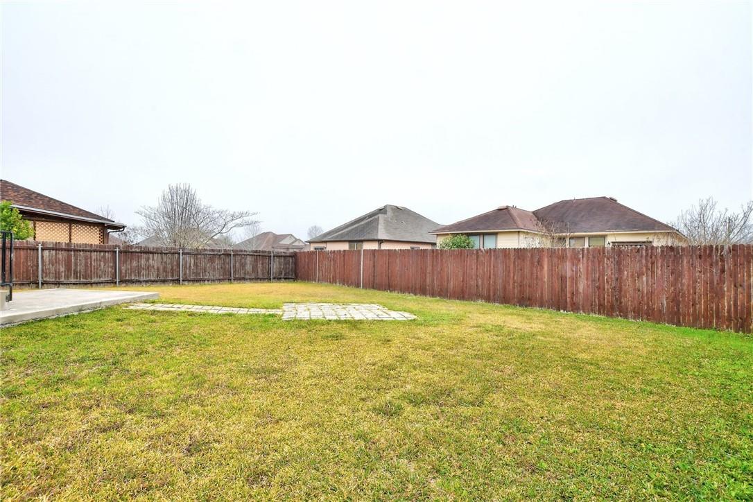 356 Matthews Kyle, TX 78640 - Photo 22 of 30 A fully fenced yard offers a private green space for outdoor activities and relaxation.