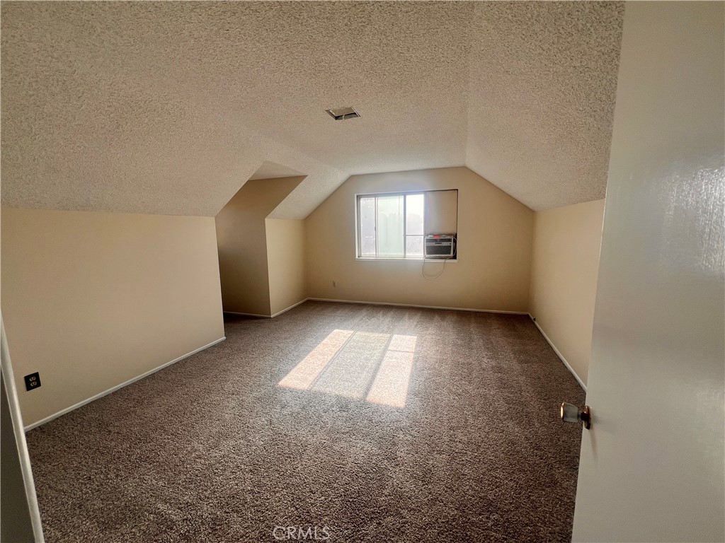 3694 Gay Way Riverside, CA 92504 - Photo 15 of 26 an empty room with a empty space and windows