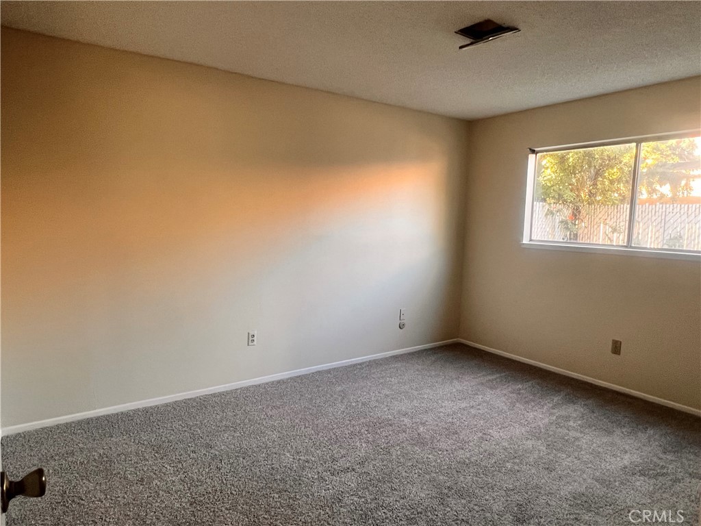 3694 Gay Way Riverside, CA 92504 - Photo 18 of 26 an empty room with a window