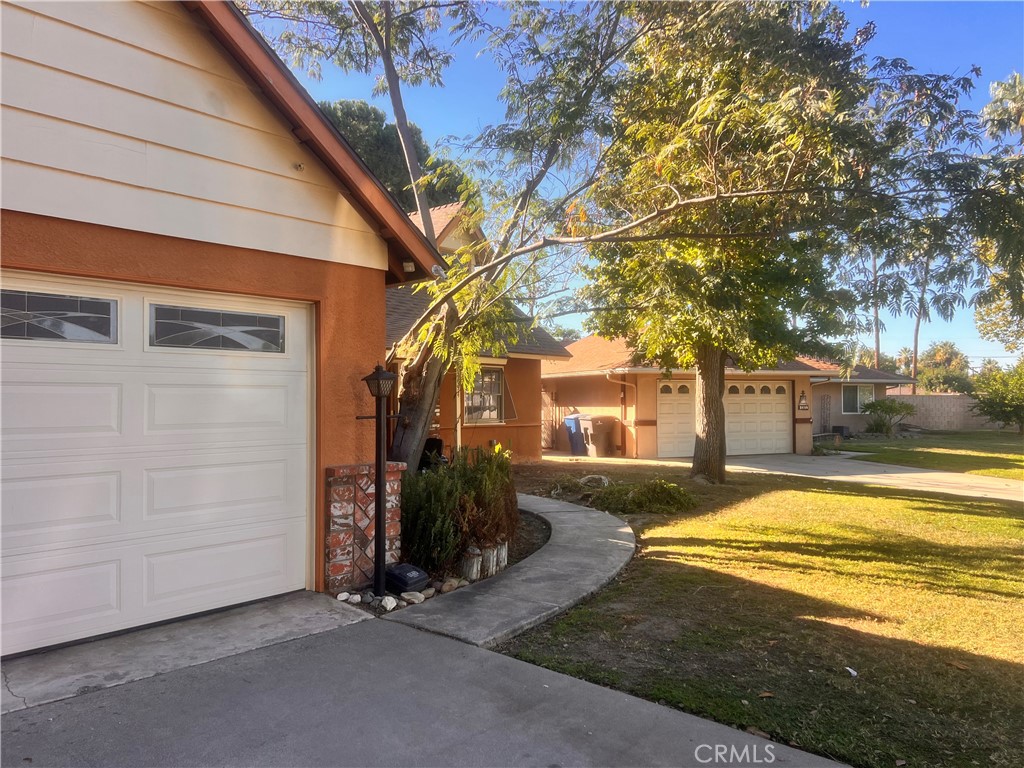 3694 Gay Way Riverside, CA 92504 - Photo 2 of 26 a view of a house with a yard and tree