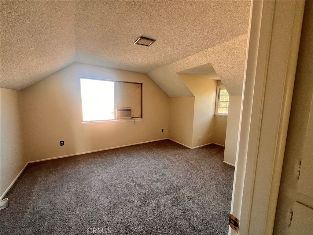 3694 Gay Way Riverside, CA 92504 - Photo 21 of 26 an empty room with windows