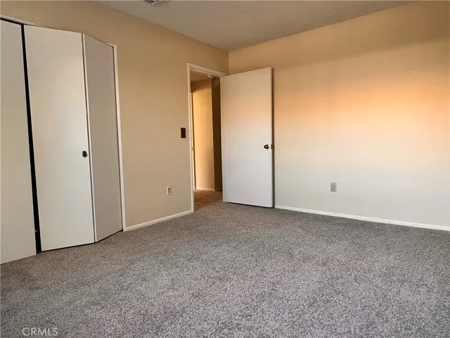 a bathroom with a shower and a window