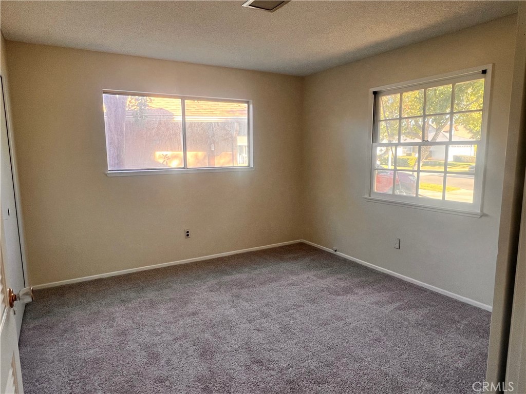 3694 Gay Way Riverside, CA 92504 - Photo 24 of 26 an empty room with a window