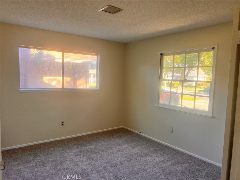 3694 Gay Way Riverside, CA 92504 - Photo 26 of 26 an empty room with a window