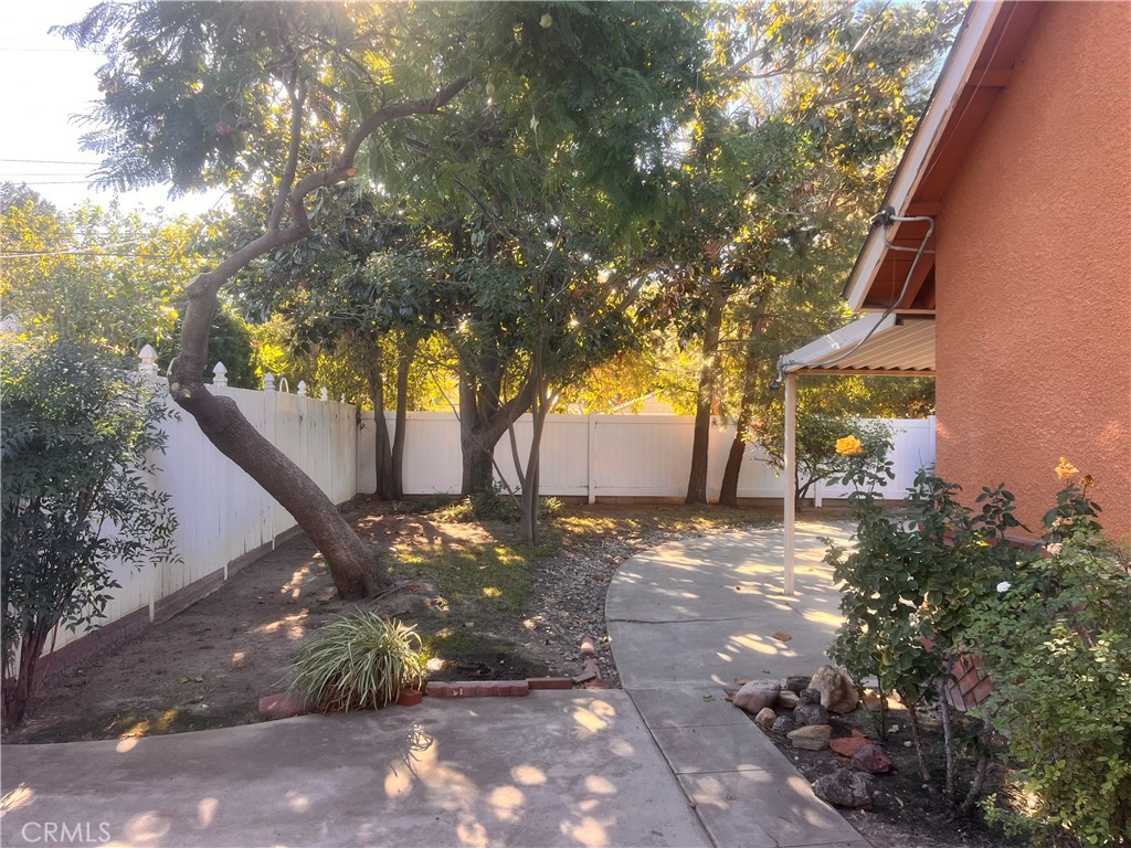 3694 Gay Way Riverside, CA 92504 - Photo 10 of 26 a view of a yard with plants and trees