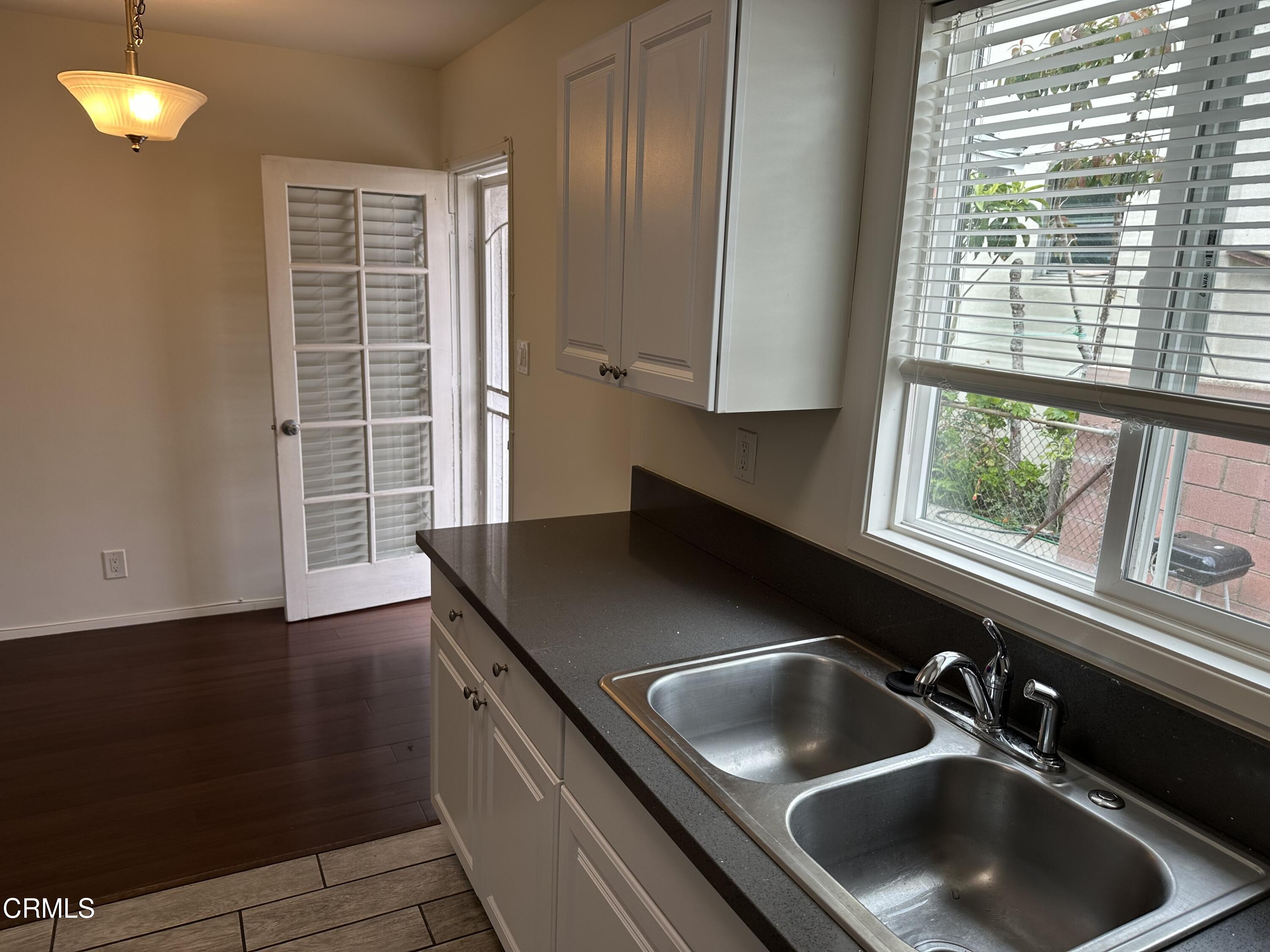 1148 Spazier Avenue, Unit B Glendale, CA 91201 - Photo 17 of 31 a kitchen with a sink and a window