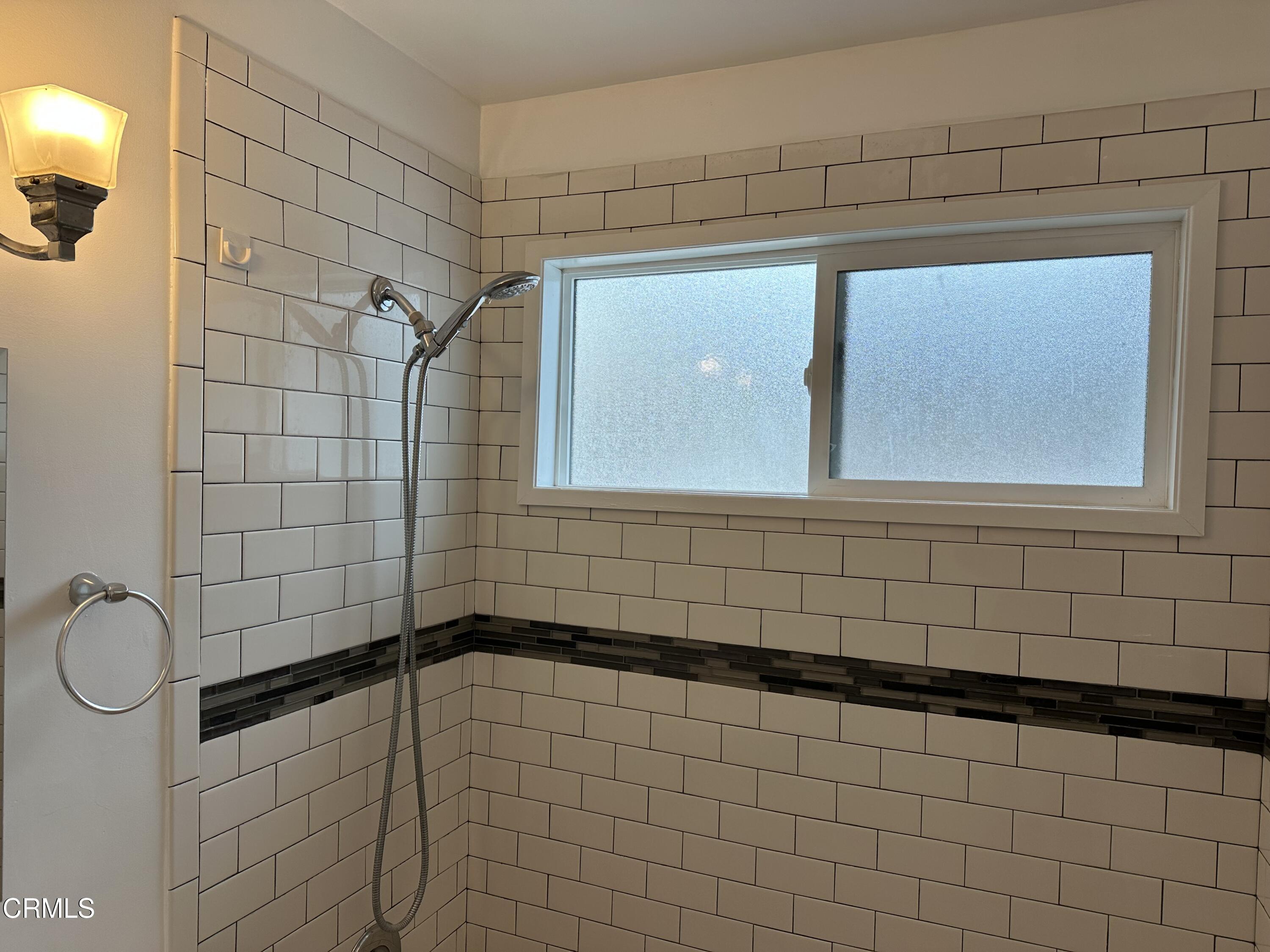 1148 Spazier Avenue, Unit B Glendale, CA 91201 - Photo 25 of 31 a bathroom with a shower