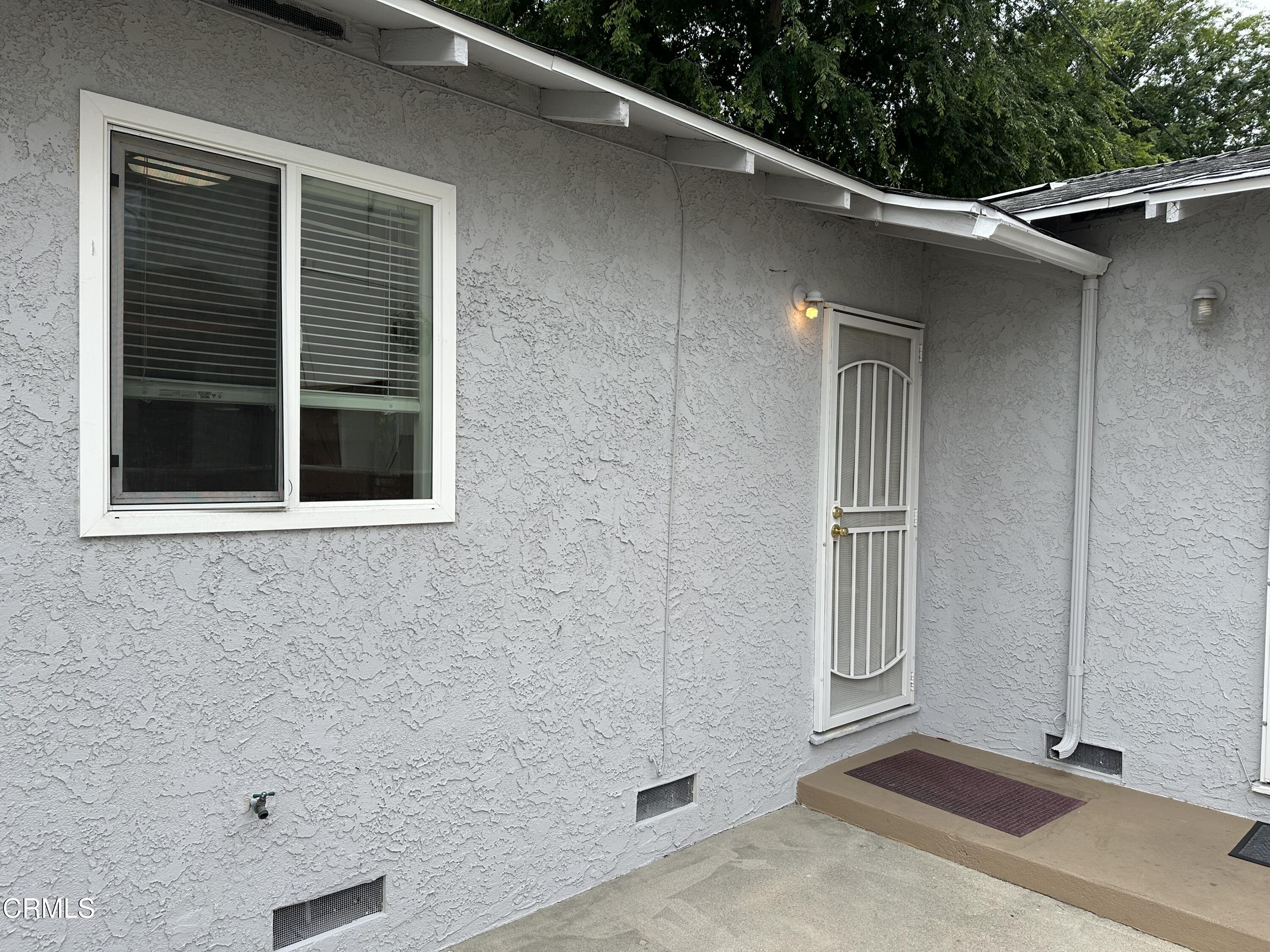1148 Spazier Avenue, Unit B Glendale, CA 91201 - Photo 28 of 31 a view of a door and a window