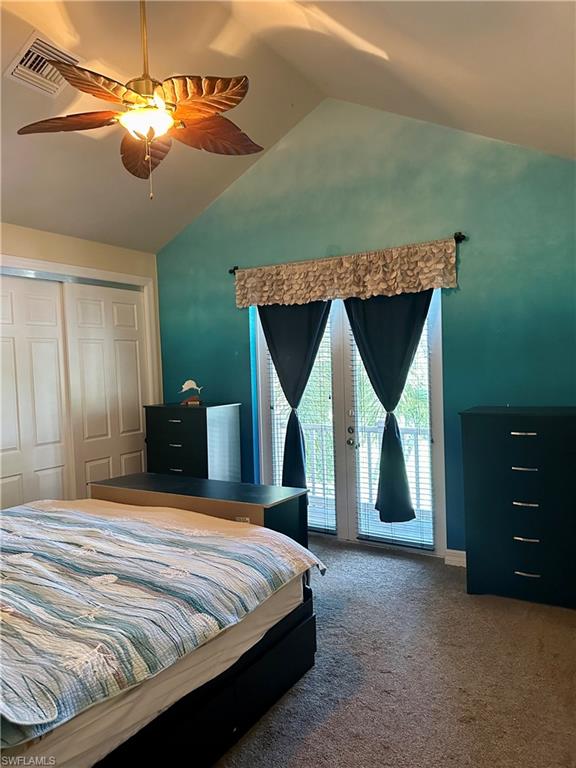 10919 Parnu Street Naples, FL 34109 - Photo 29 of 35 a bed room with a bed and a ceiling fan