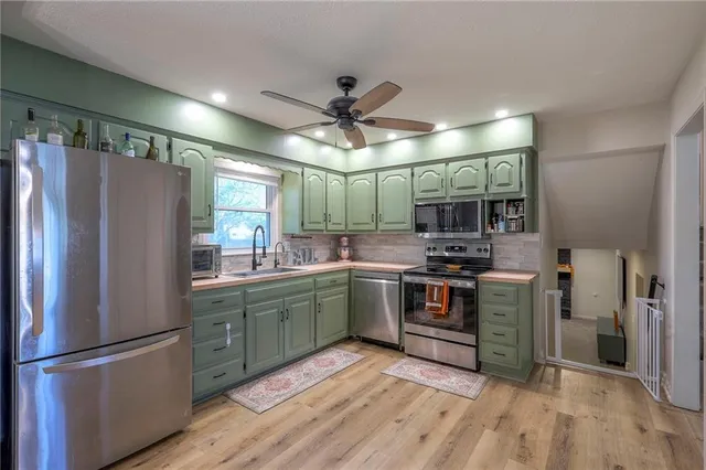 $339,900 | 227 North Woodson Drive, Raymore, MO 64083