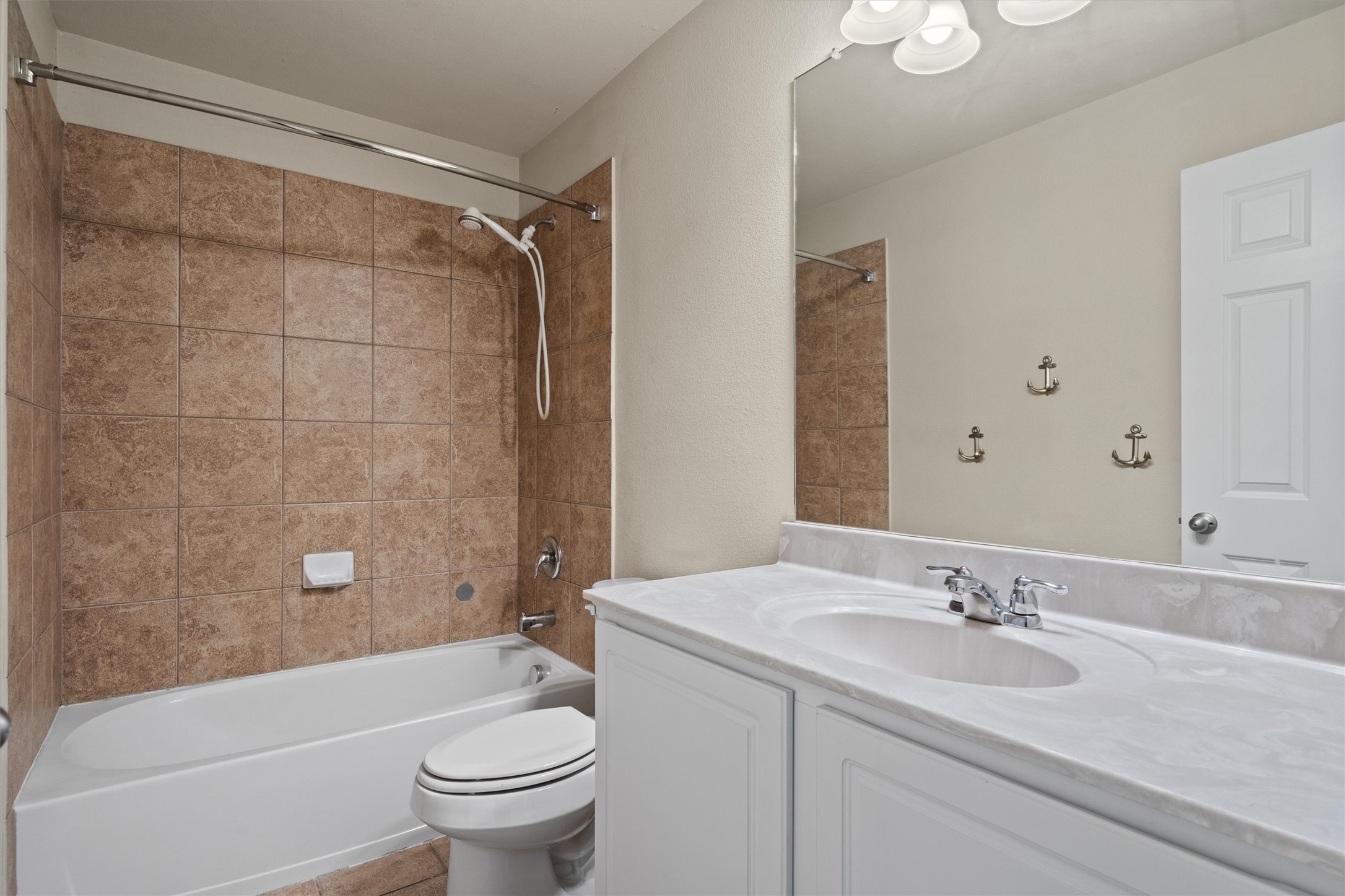 423 Wetzel Kyle, TX 78640 - Photo 27 of 35 Bathroom with vanity and shower / bath combination