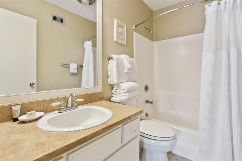 2004 Beachwood Road, Unit 2004 Fernandina Beach, FL 32034 - Photo 37 of 54 a bathroom with a sink toilet and shower