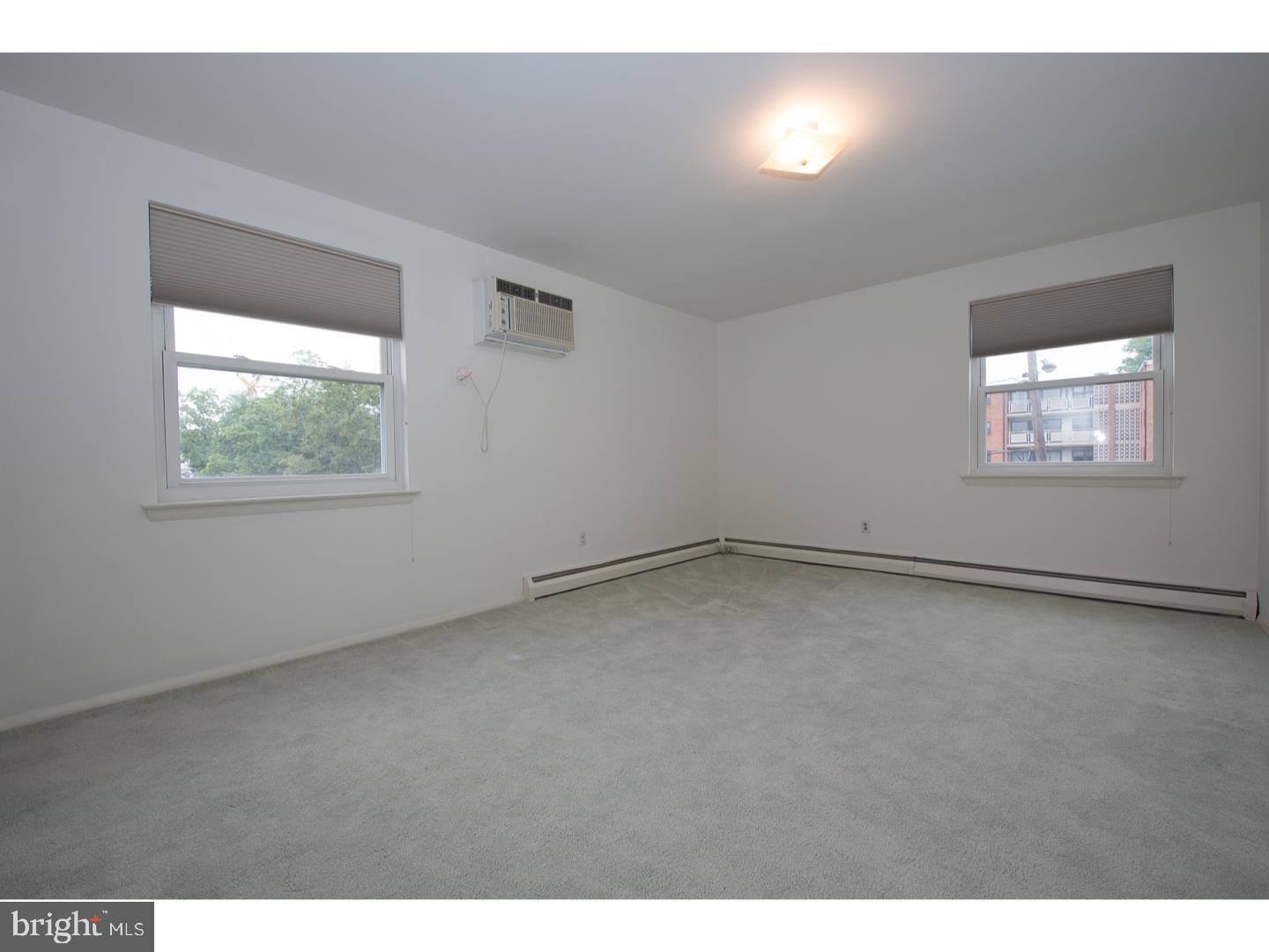 48 Llanfair Road, Unit 12 Ardmore, PA 19003 - Photo 12 of 18 Master Bedroom