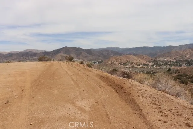 a view of a lake with mountains in the background