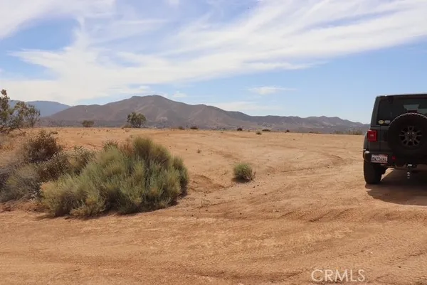 a view of a lake with a mountain