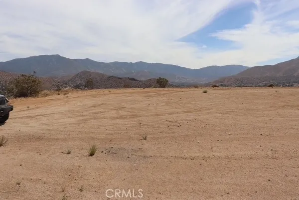 a view of outdoor space and mountain view