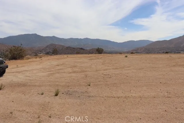 a view of outdoor space and mountain view