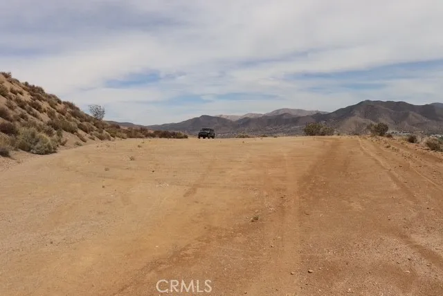 a view of lake with mountain