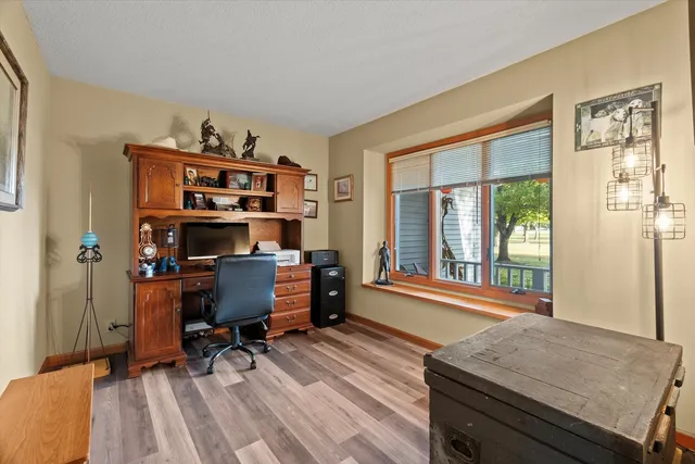 a workspace with furniture and window